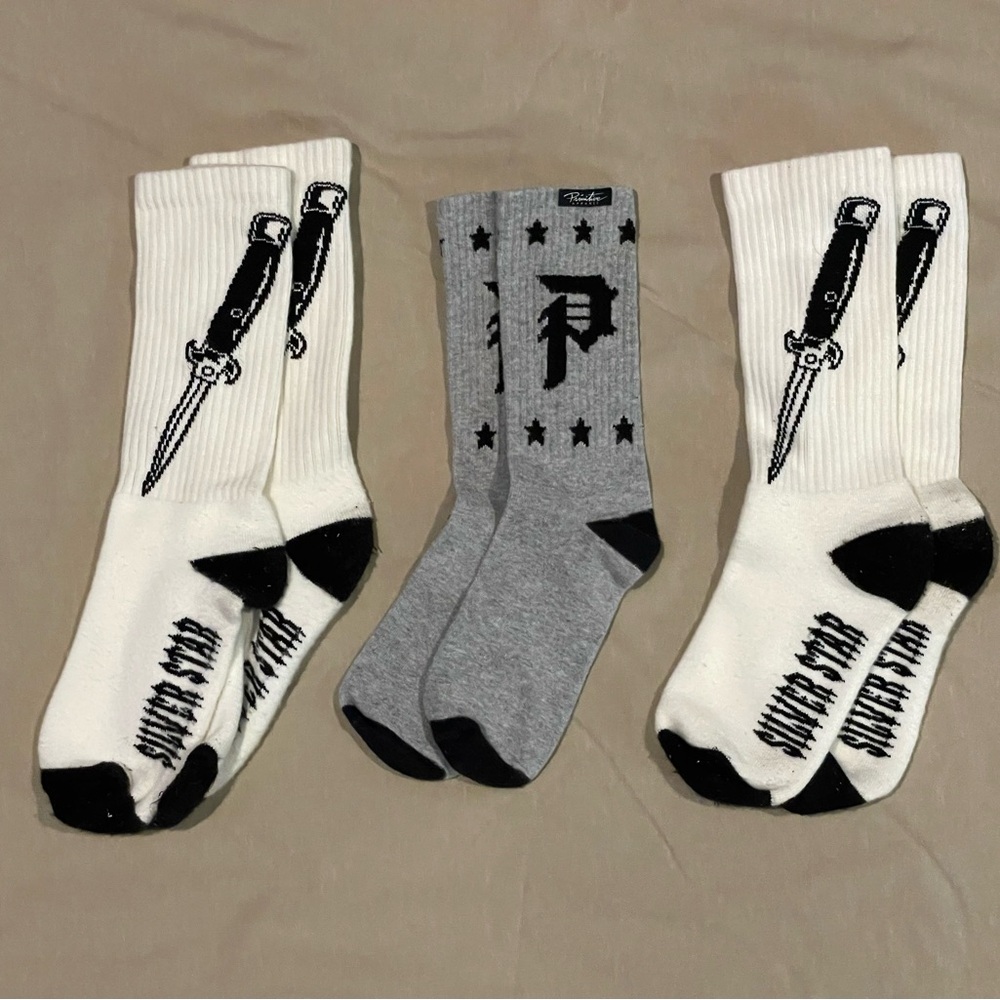 2 pr. of Silver Star “Switchblade “ and 1 pr. Primitive Skateboard Socks